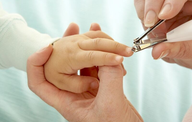 Cutting nails to a child